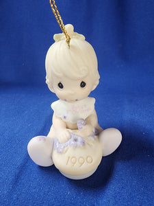 Precious Moments "Baby's First Christmas Ornament - 1990 Girl"