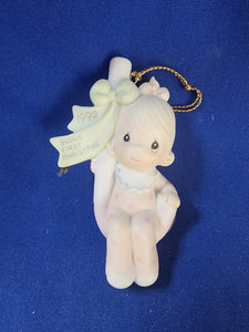 Precious Moments "Baby's First Christmas Ornament - 1992 Girl"