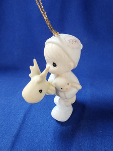 Precious Moments "Baby's First Christmas Ornament - 1994 Boy"