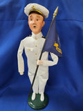 Byer's Choice Carolers "Navy Man With Flag (2025)"