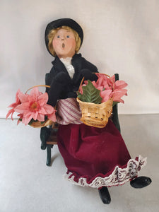 Byer's Choice Carolers "Lady Selling Poinsettias with Bench (2000)"